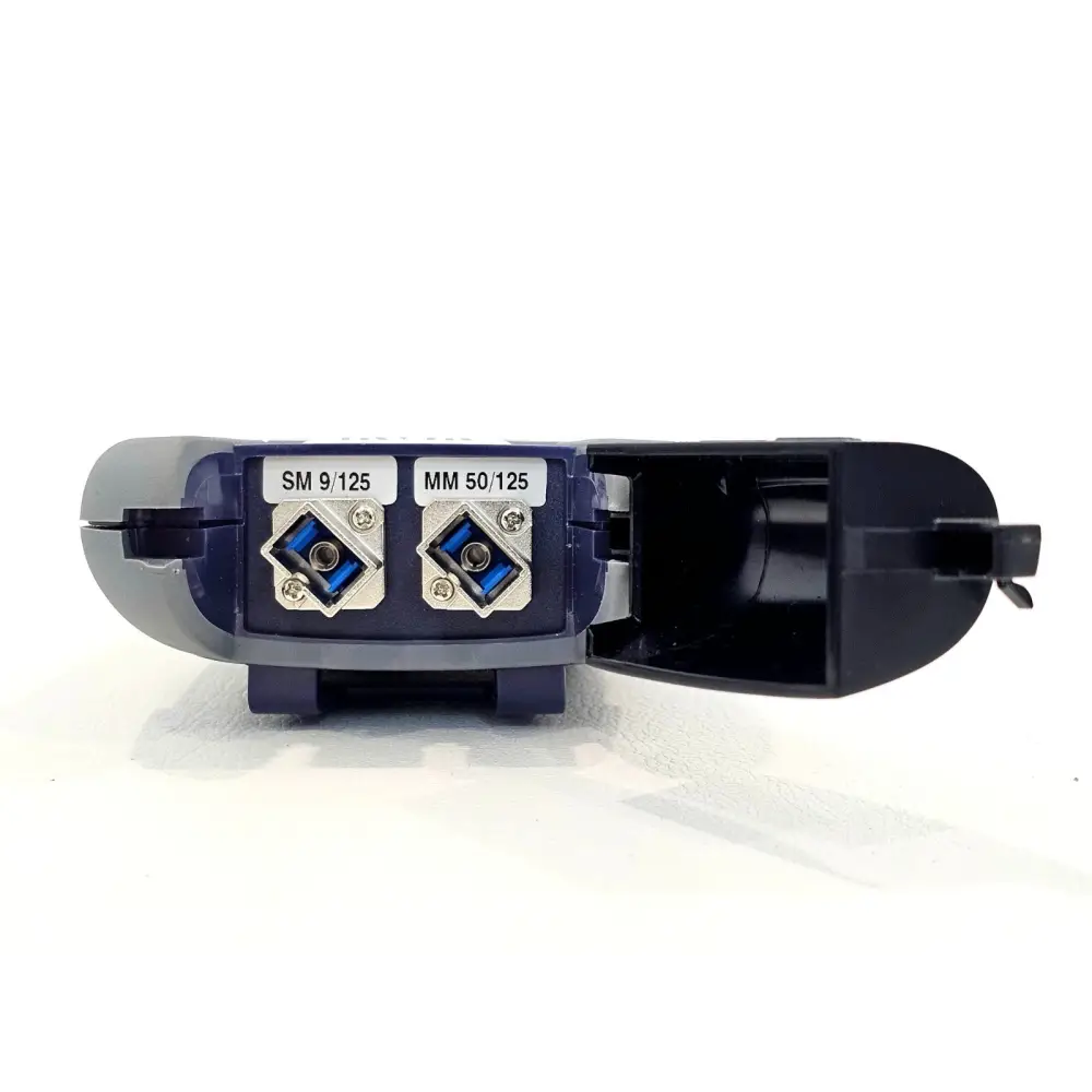 Close-up of OLP-82P connector ports showing 1.25mm and 2.5mm adapters