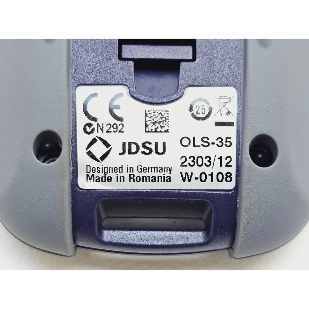 JDSU OLS-35 keypad detail showing buttons and rubber wear on one key