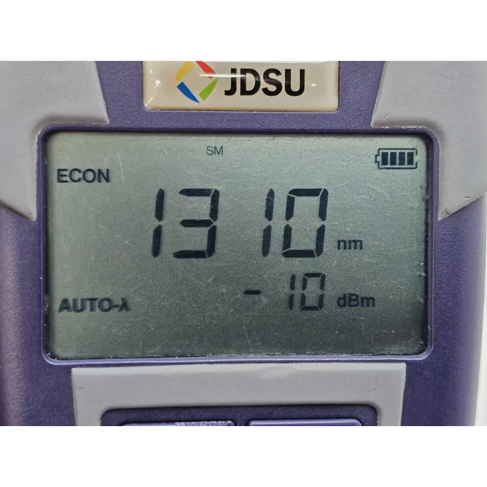 Viavi JDSU OLS-35 unit placed alongside FC adapter showing included accessories