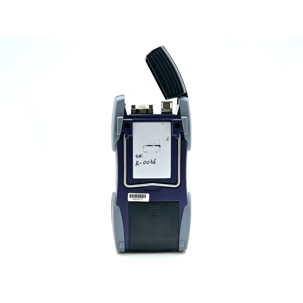 JDSU OLT-55 SmartClass OLTS rear view with port cover open showing serial number label R-0036