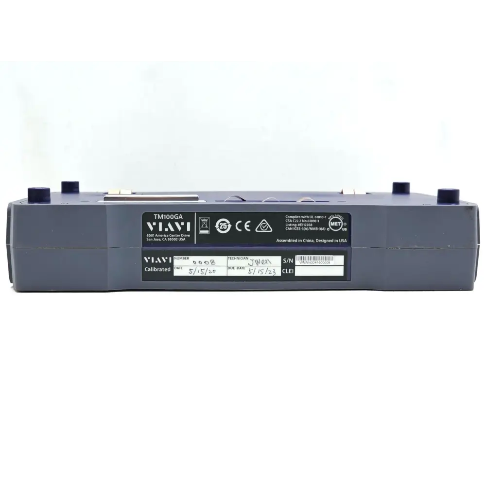 Viavi TM100GA rear label showing model TM100GA, calibration date 5/15/20, due date 5/15/23, serial number WMNN0041600008