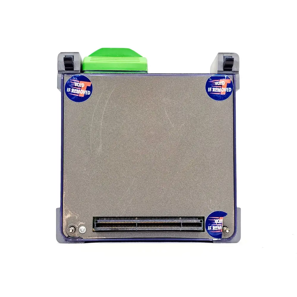 JDSU 4126 LM OTDR module connector face showing APC green port cap, multi-pin edge connector, and void-if-removed security stickers