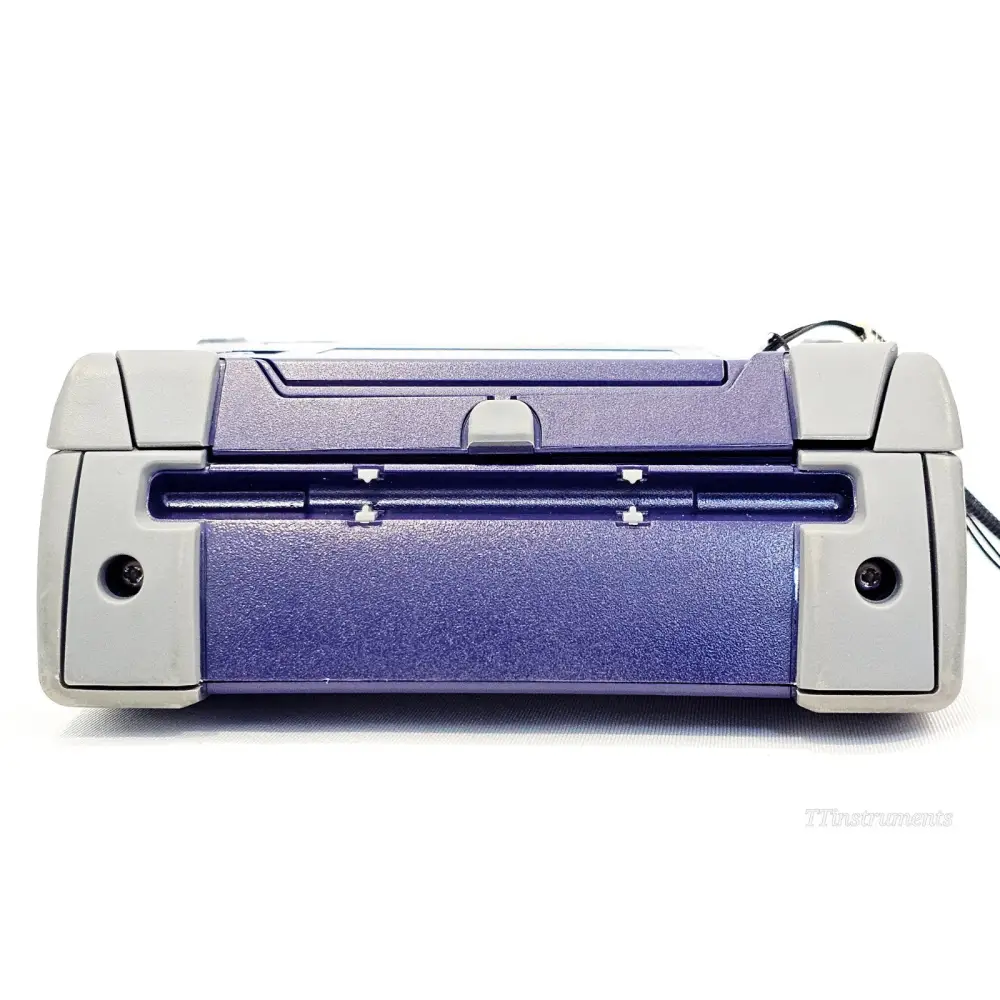VIAVI SmartOTDR E118FA65 bottom view showing battery compartment slot and rubber feet