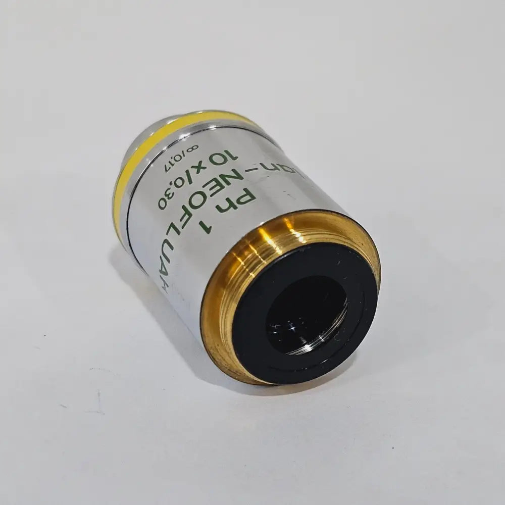 ZEISS Plan-NEOFLUAR 10x/0.30 Ph 1 objective lens angled view showing front lens element and thread mount
